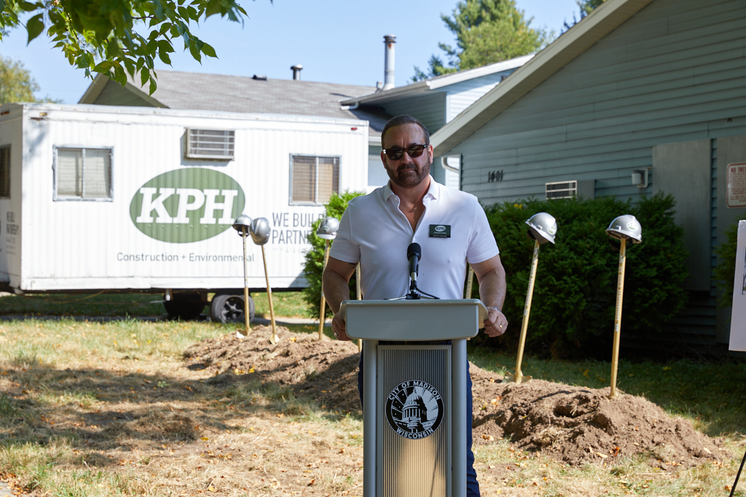 a man standing at a podium